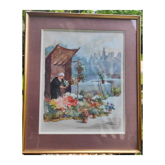 Aquarelle originale La Fleuriste de Jeanine Leblanc sur papier gaufré, œuvre signée et encadrée sous verre, format 40 x 48 cm.
